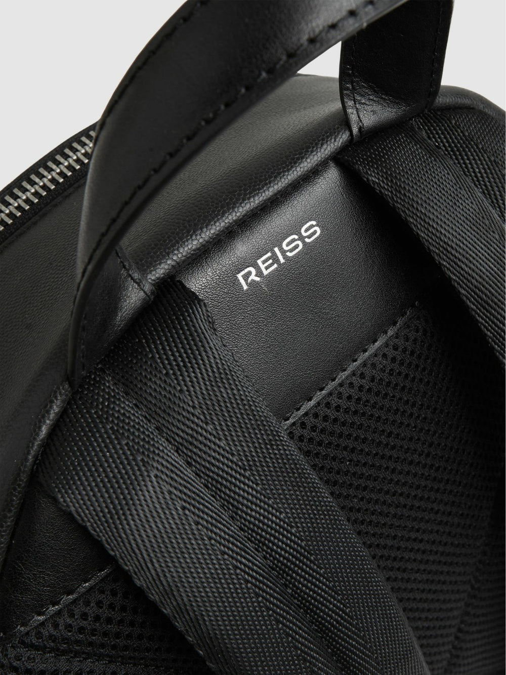 Men Micro-Grain Leather Backpack in Black