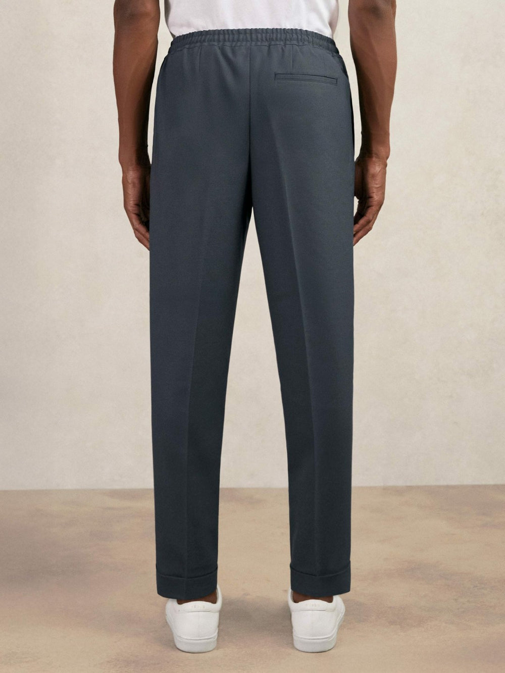 Men Relaxed-Fit Pleated Tapered Trousers in Steel Blue