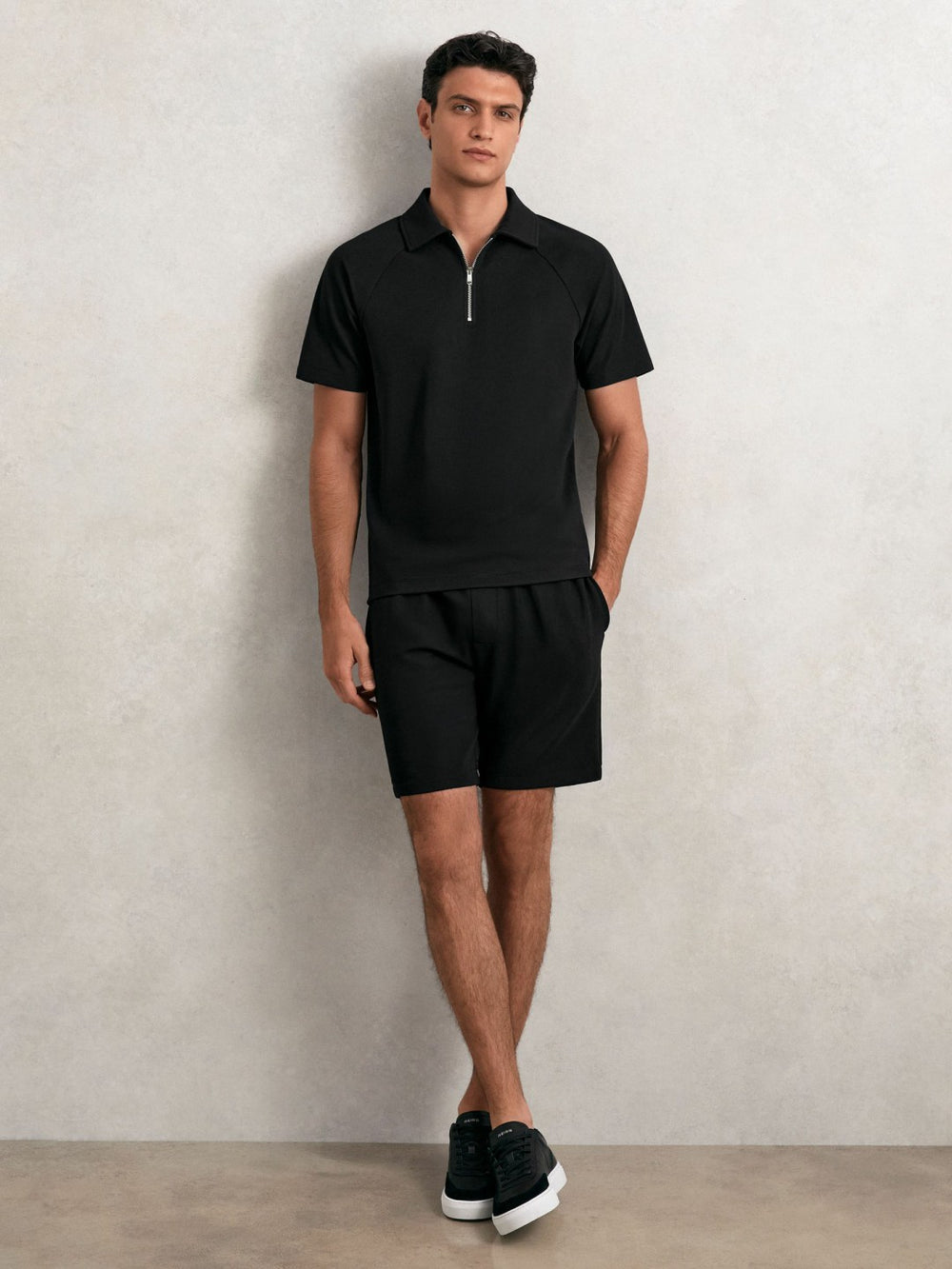 Men Textured Raglan Half-Zip Polo Shirt in Black