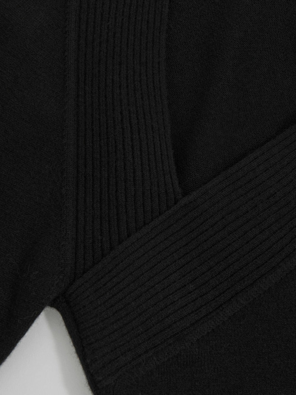 Women Wool-Blend Asymmetric Knit Top in Black