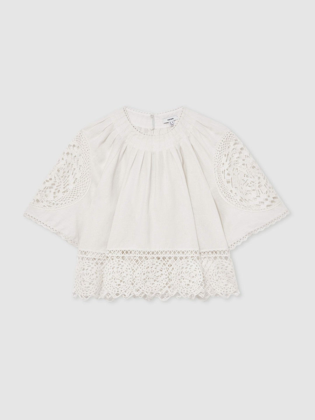 Women Linen Embroidered Swing Top in Ivory