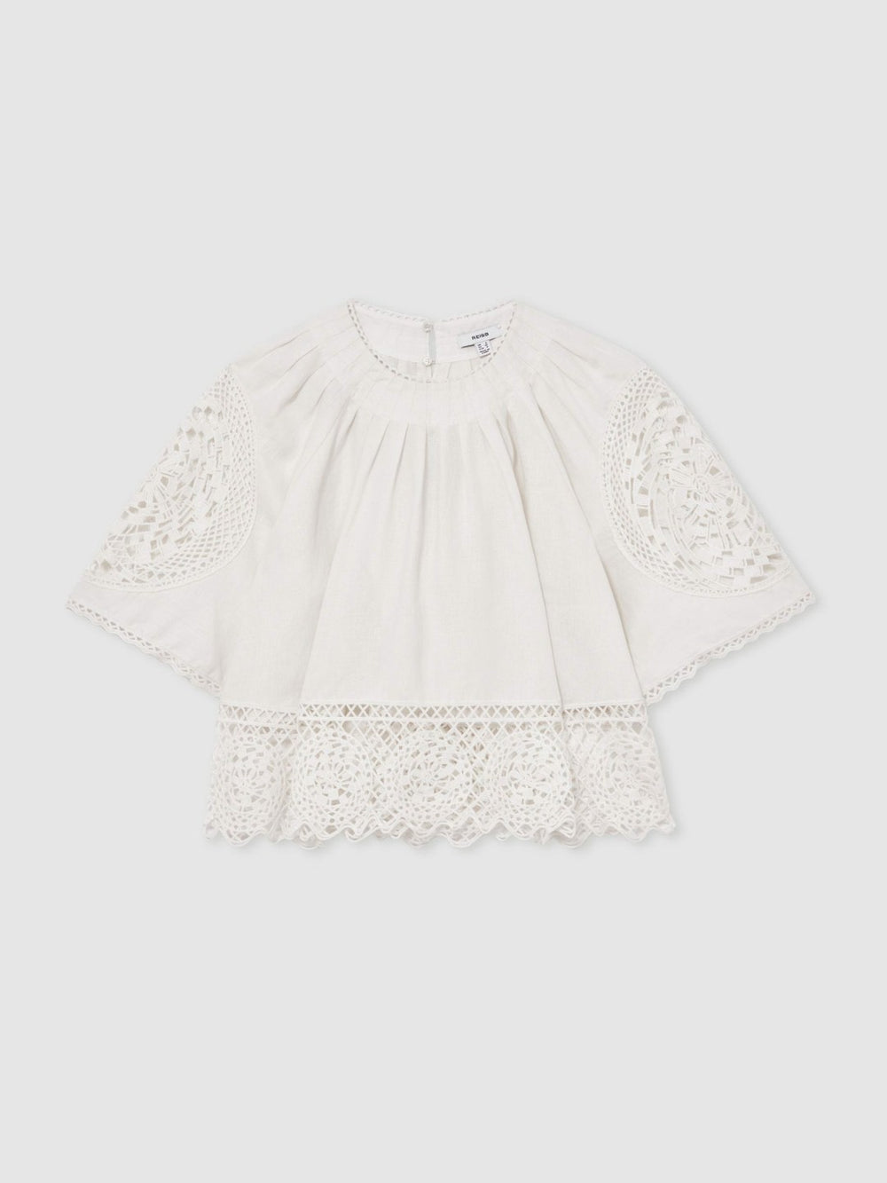 Women Linen Embroidered Swing Top in Ivory