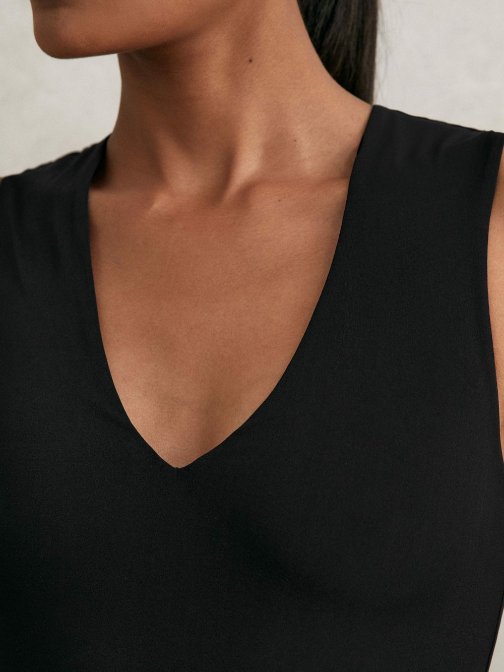 Women V-Neck Sleeveless Bodysuit in Black