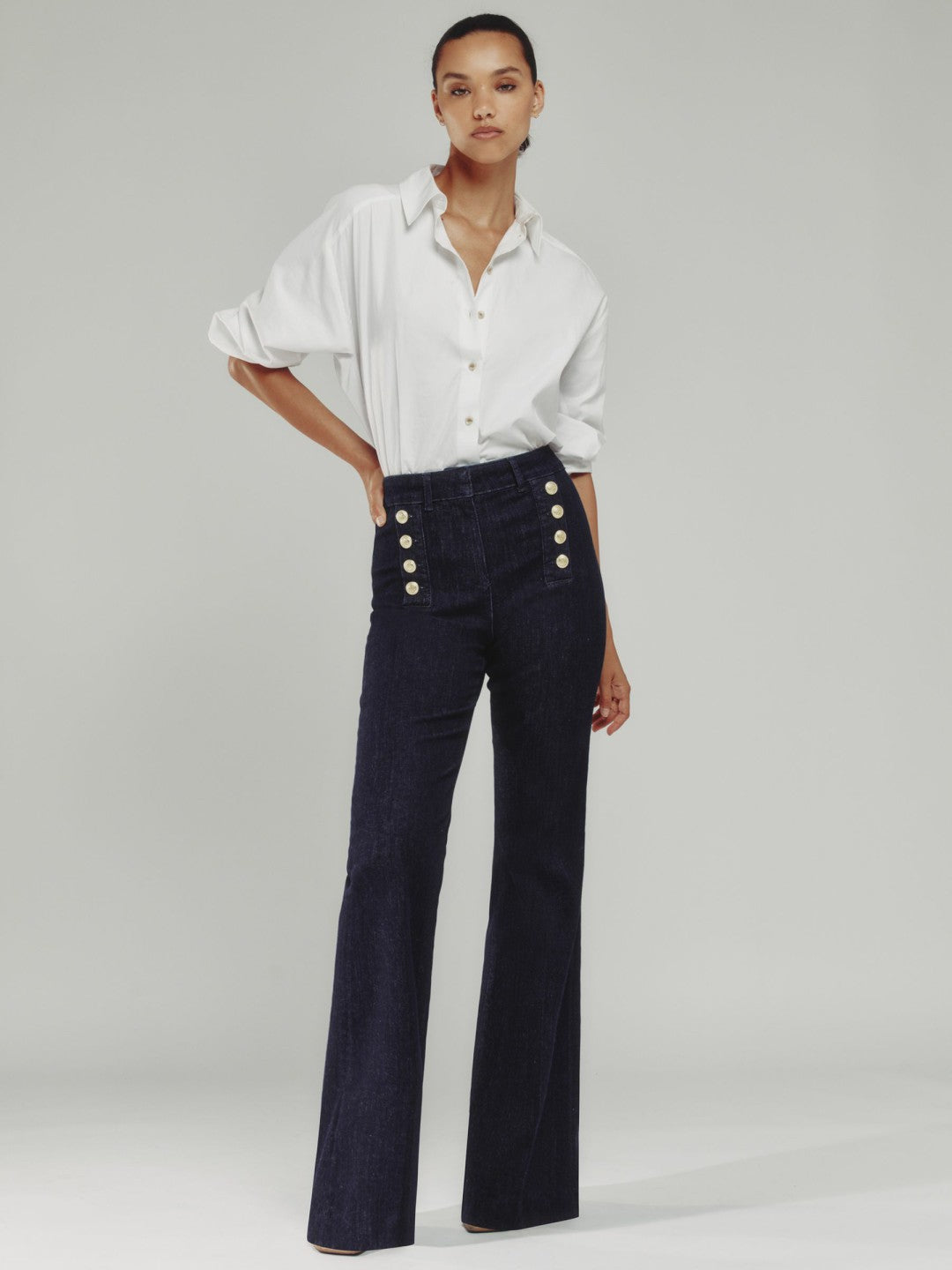 Women Petite Button-Detail High-Rise Flared Jeans in Dark Blue